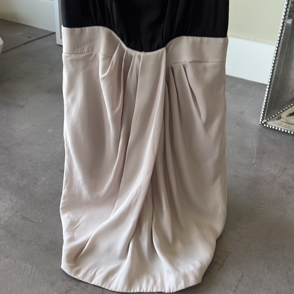 Color block dress. Blk spaghetti straps on top and beige bottom. Has pockets. - Picture 2 of 6